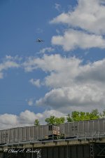 PLANE OVER COAL TRAIN
